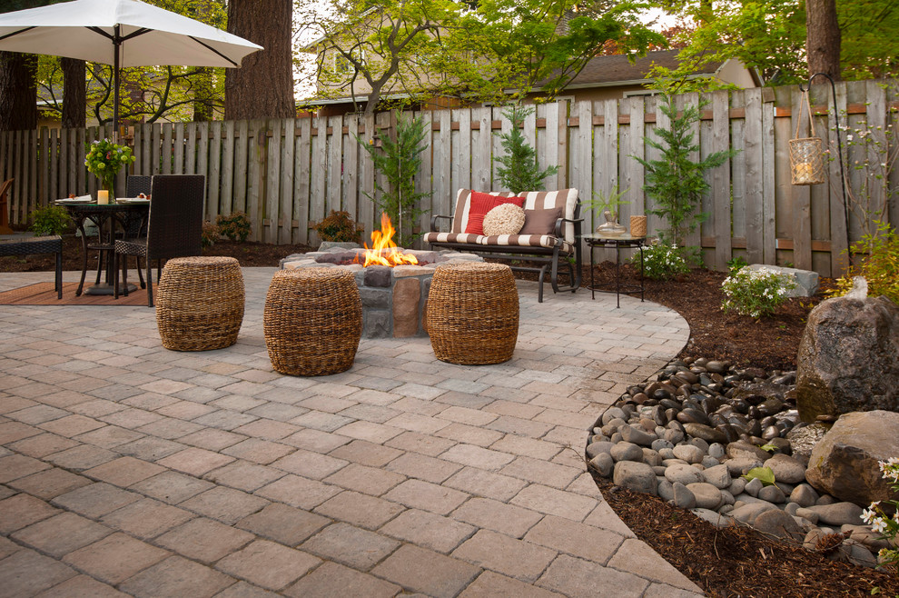 Traditional patio in Portland with a fire feature.