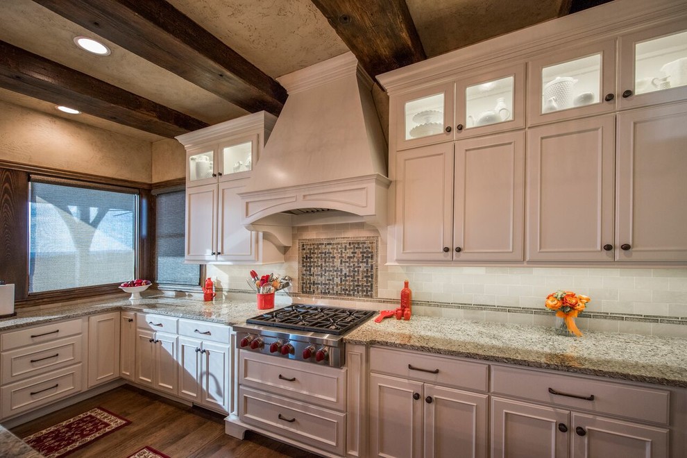 Inspiration for a huge rustic u-shaped dark wood floor open concept kitchen remodel with an undermount sink, beaded inset cabinets, white cabinets, granite countertops, white backsplash, stainless steel appliances and an island
