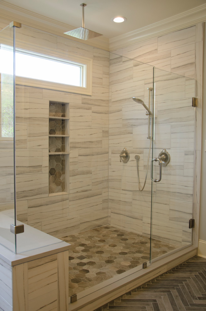 Example of a master ceramic tile ceramic tile and gray floor freestanding bathtub design with gray walls