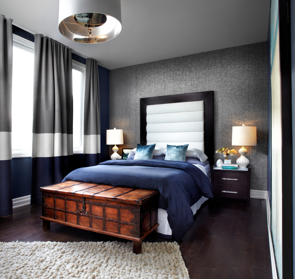 Inspiration for a mid-sized contemporary master bedroom in Toronto with dark hardwood floors, grey walls and brown floor.