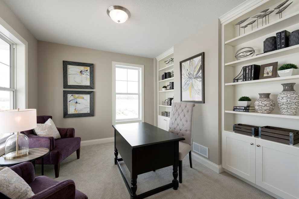 Design ideas for a transitional home office in Minneapolis with grey walls, carpet, a freestanding desk and grey floor.