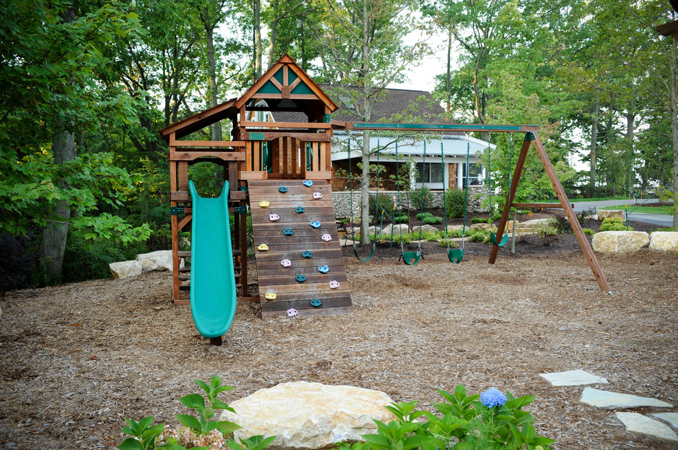Eclectic garden in Grand Rapids with with outdoor playset.