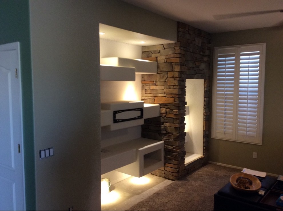 Small mountain style open concept carpeted family room photo in Phoenix with brown walls, no fireplace and a wall-mounted tv