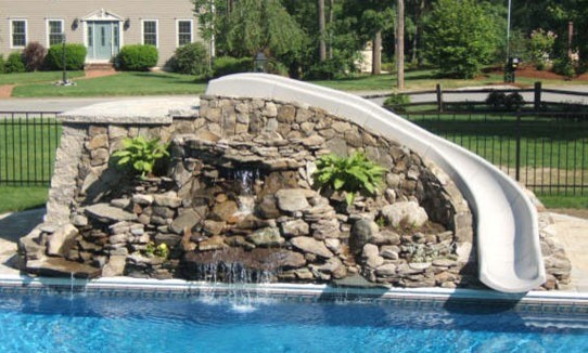 This is an example of a beach style pool in Sydney.