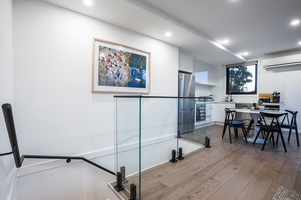 Example of a transitional kitchen design in Melbourne