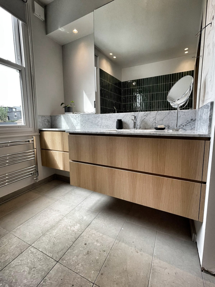 Example of a mid-sized minimalist kids' single-sink bathroom design in London with flat-panel cabinets, medium tone wood cabinets, quartzite countertops, white countertops and a floating vanity