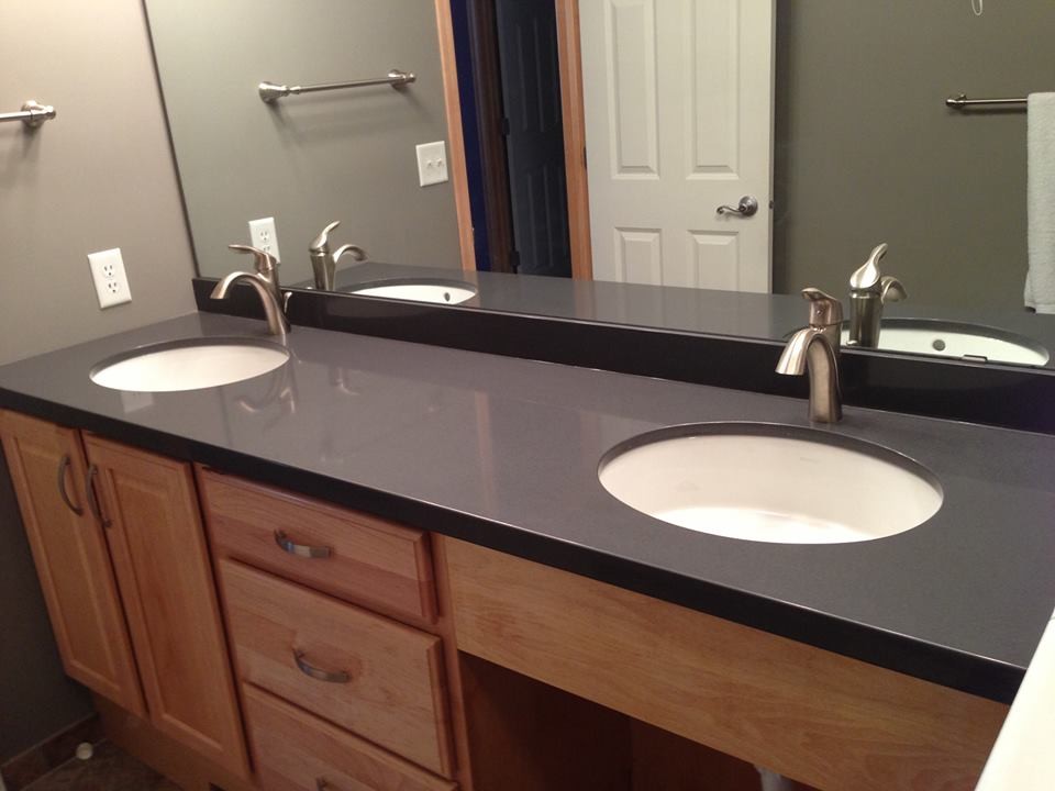 Example of a large bathroom design in Minneapolis with a drop-in sink and granite countertops