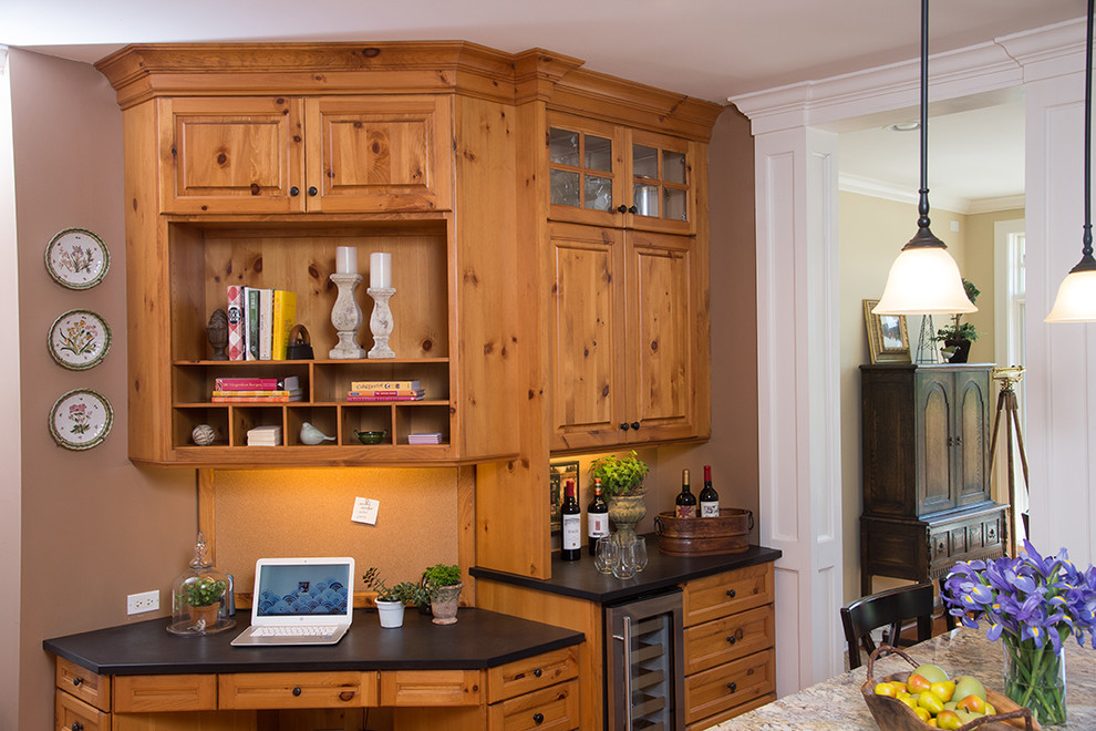 Example of a large mountain style u-shaped light wood floor open concept kitchen design in Chicago with an undermount sink, raised-panel cabinets, distressed cabinets, granite countertops, white backsplash, subway tile backsplash, stainless steel appliances and an island