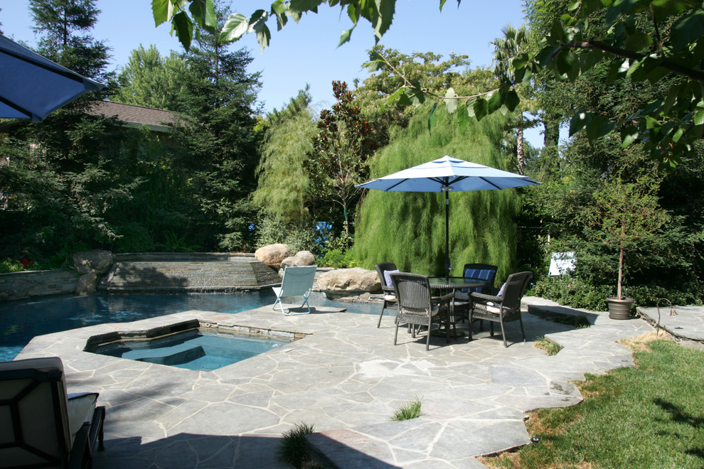 Design ideas for a traditional custom-shaped pool in Los Angeles.