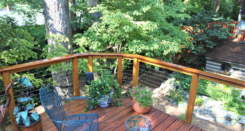 Inspiration for a large contemporary deck in DC Metro with a container garden and no cover.