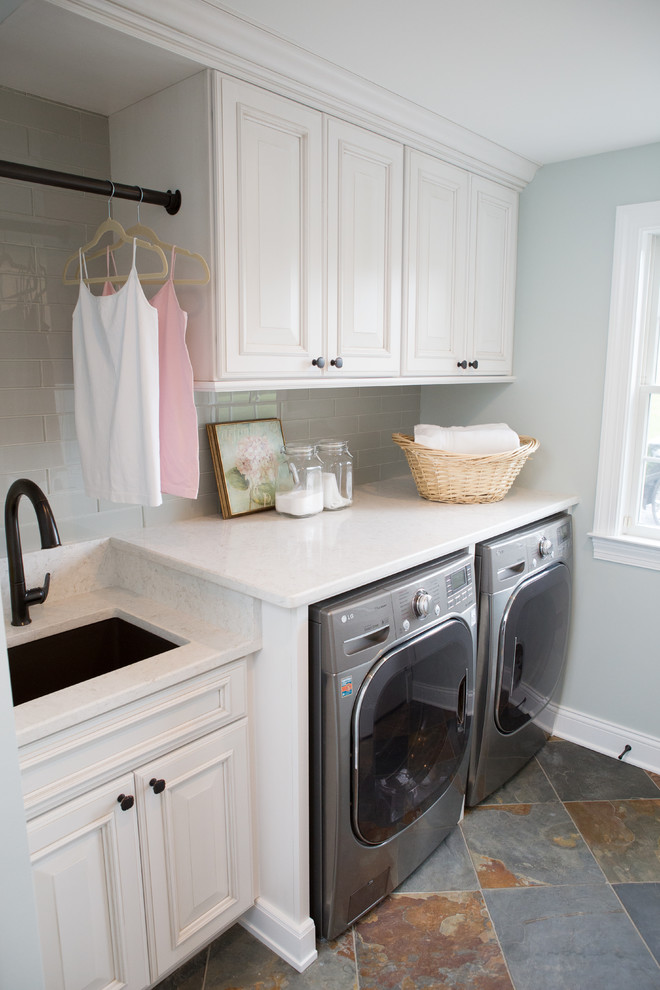 Photo of a mid-sized traditional galley dedicated laundry room in Chicago.