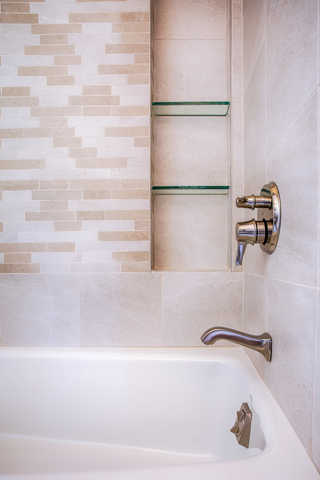 Example of a small transitional beige tile and porcelain tile porcelain tile and beige floor alcove bathtub design in Phoenix with flat-panel cabinets, medium tone wood cabinets, a one-piece toilet, beige walls, a vessel sink and granite countertops