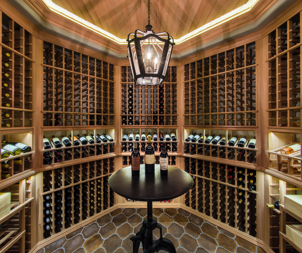 Small traditional wine cellar in Chicago with storage racks.