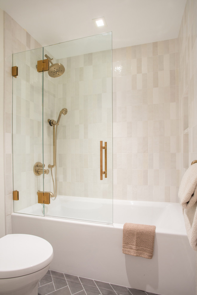 Example of a mid-sized minimalist kids' gray tile and ceramic tile porcelain tile, gray floor and double-sink alcove bathtub design in Seattle with flat-panel cabinets, white cabinets, a one-piece toilet, white walls, an undermount sink, quartz countertops, a hinged shower door, white countertops, a niche and a built-in vanity