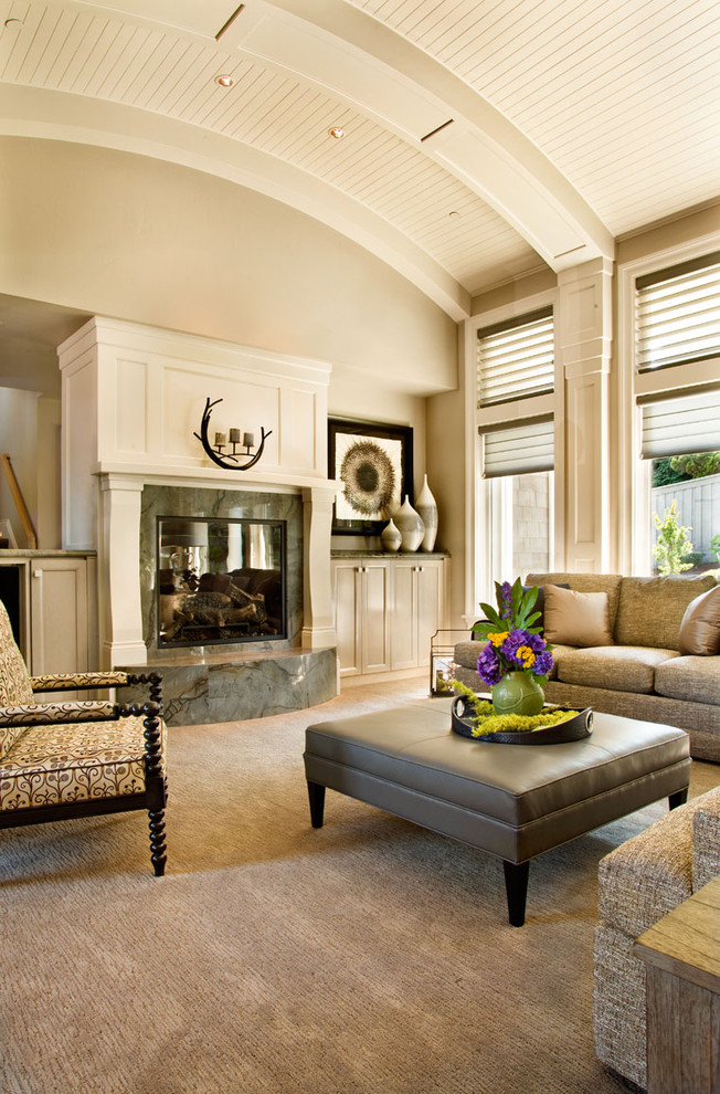 Design ideas for a large traditional living room in Portland with beige walls.
