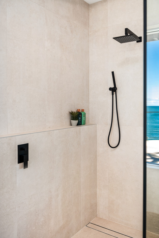 Inspiration for a large coastal shower room bathroom in Central Coast with light wood cabinets, a freestanding bath, a walk-in shower, beige tiles, a built-in sink, an open shower, white worktops, double sinks and a floating vanity unit.