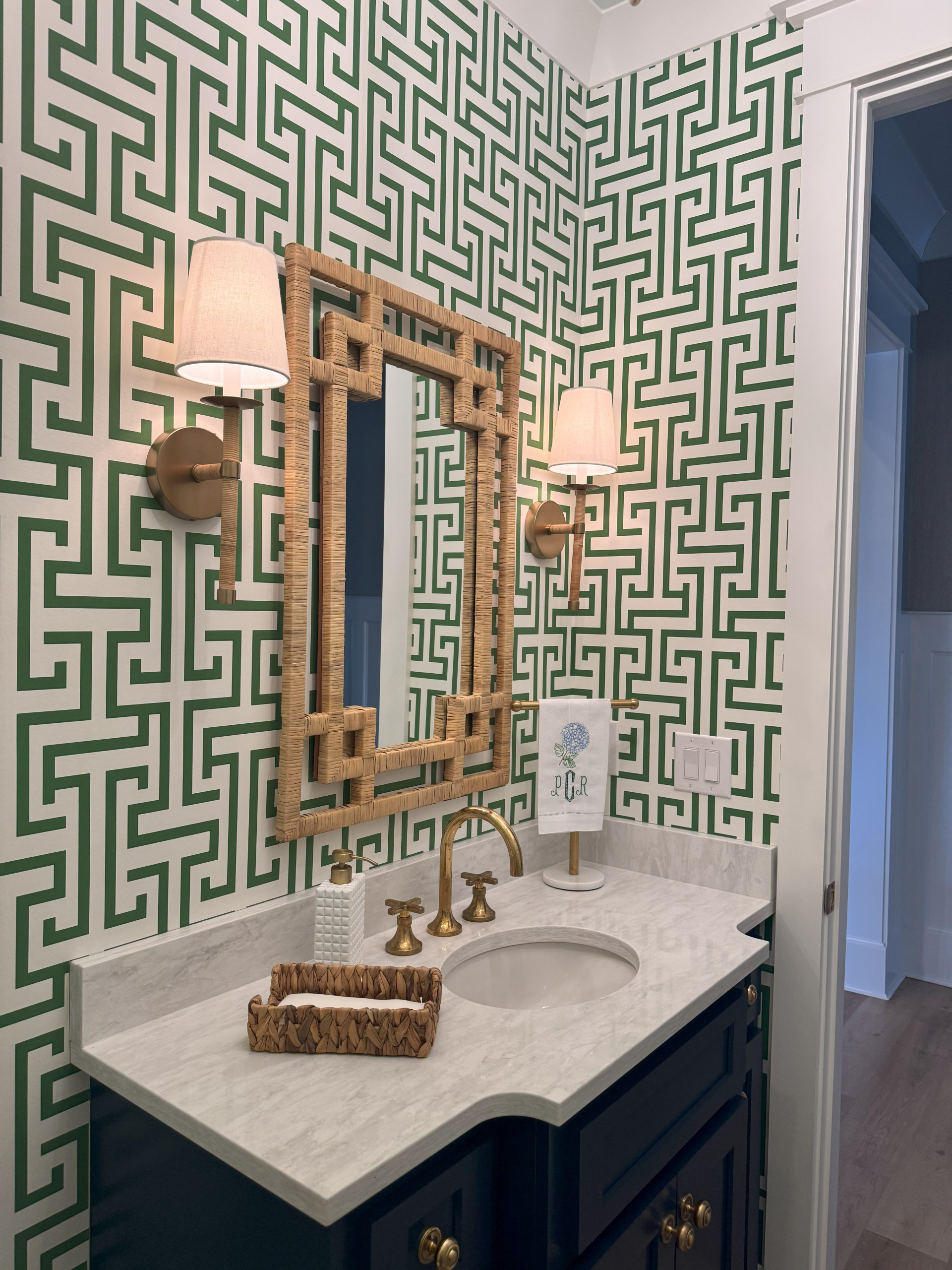 Example of a beach style powder room design in Birmingham