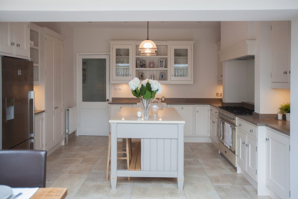 This is an example of a contemporary kitchen in Surrey.