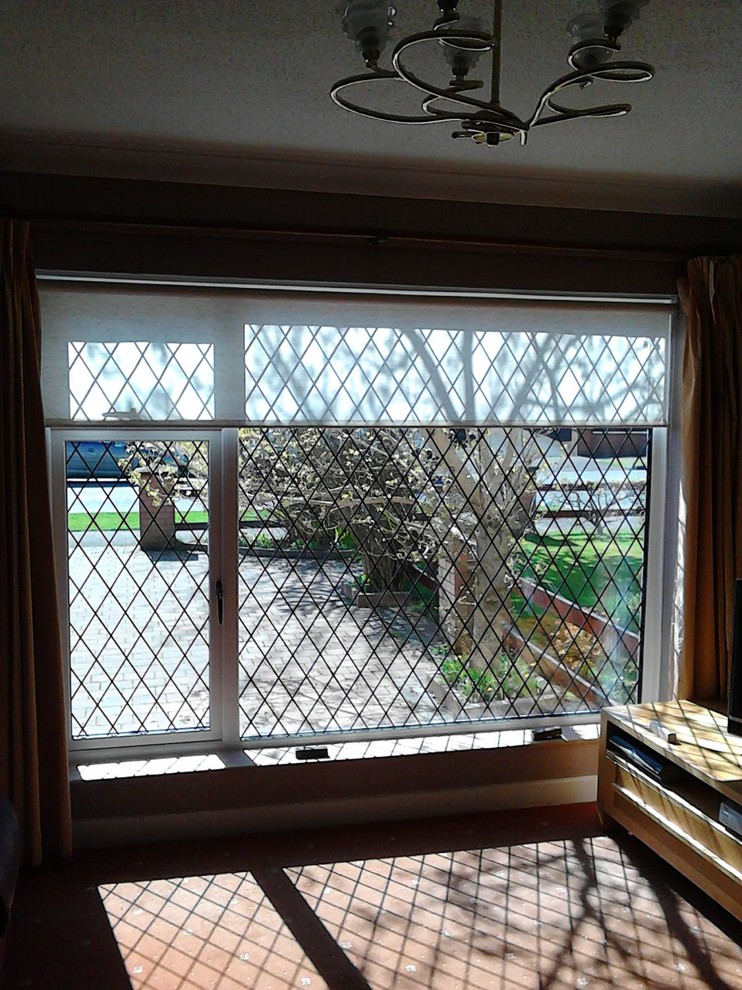 Photo of a mid-sized transitional two-storey beige exterior in Dublin.