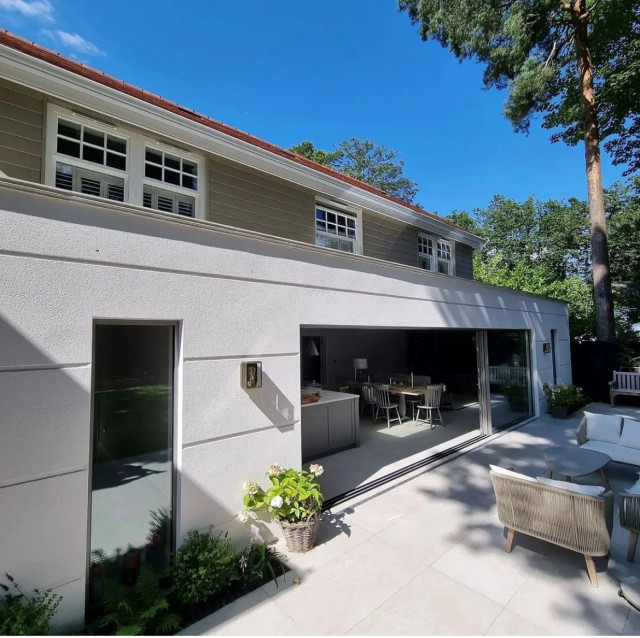 Charisma Rose in New-England style home contemporary-exterior