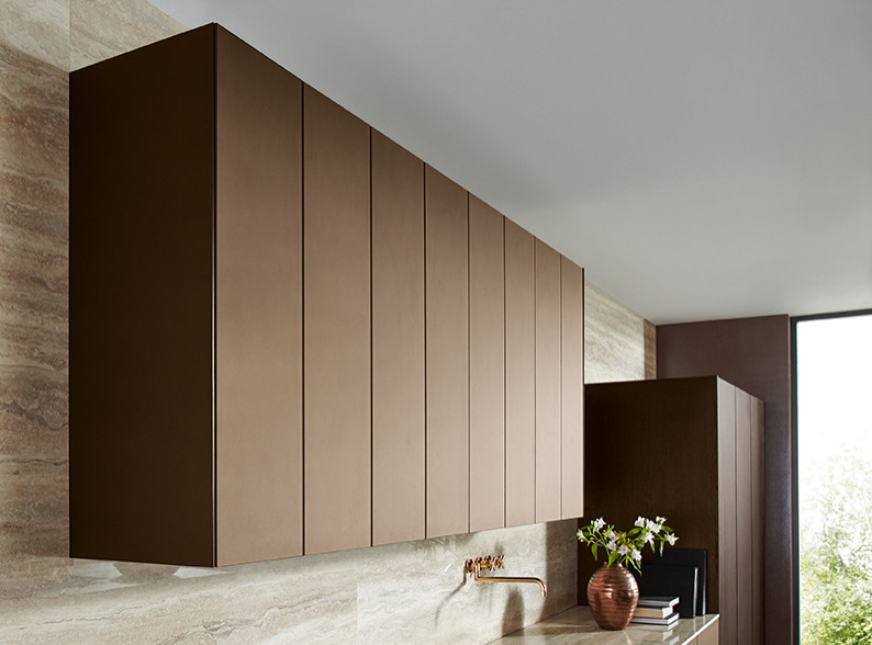 Inspiration for a contemporary open plan kitchen in Nuremberg with brown cabinets and grey worktops.