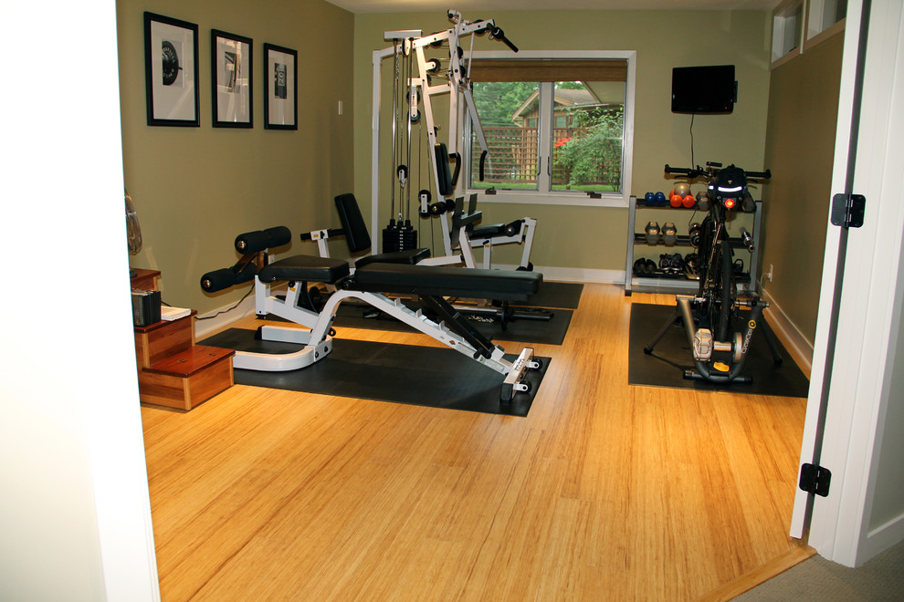 Contemporary home gym in Baltimore with bamboo floors and yellow floor.