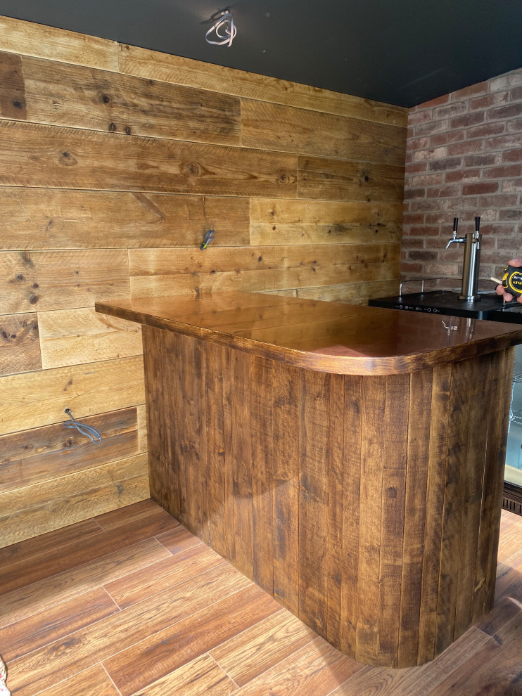 Photo of an industrial home bar in Other.