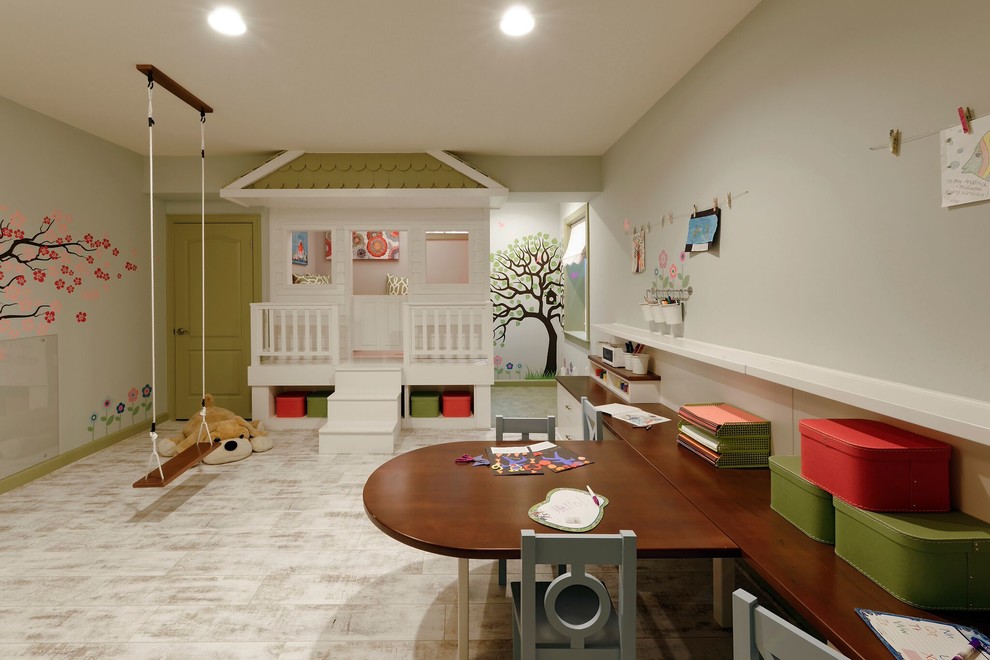 Mid-sized eclectic gender-neutral kids' playroom in DC Metro with light hardwood floors, grey walls and white floor for kids 4-10 years old.
