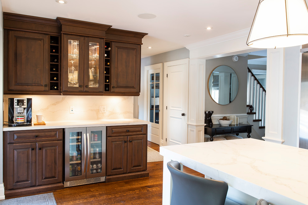 Example of a transitional kitchen design in Toronto