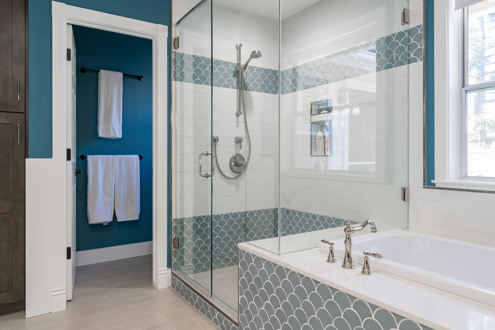 Large modern master bathroom in Miami with shaker cabinets, brown cabinets, a japanese tub, an alcove shower, a one-piece toilet, white tile, subway tile, blue walls, ceramic floors, an integrated sink, marble benchtops, beige floor, a hinged shower door and white benchtops.