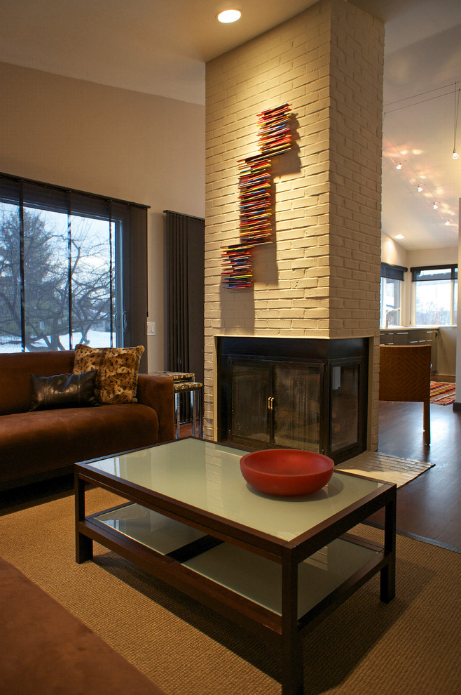 Design ideas for a modern family room in Detroit.