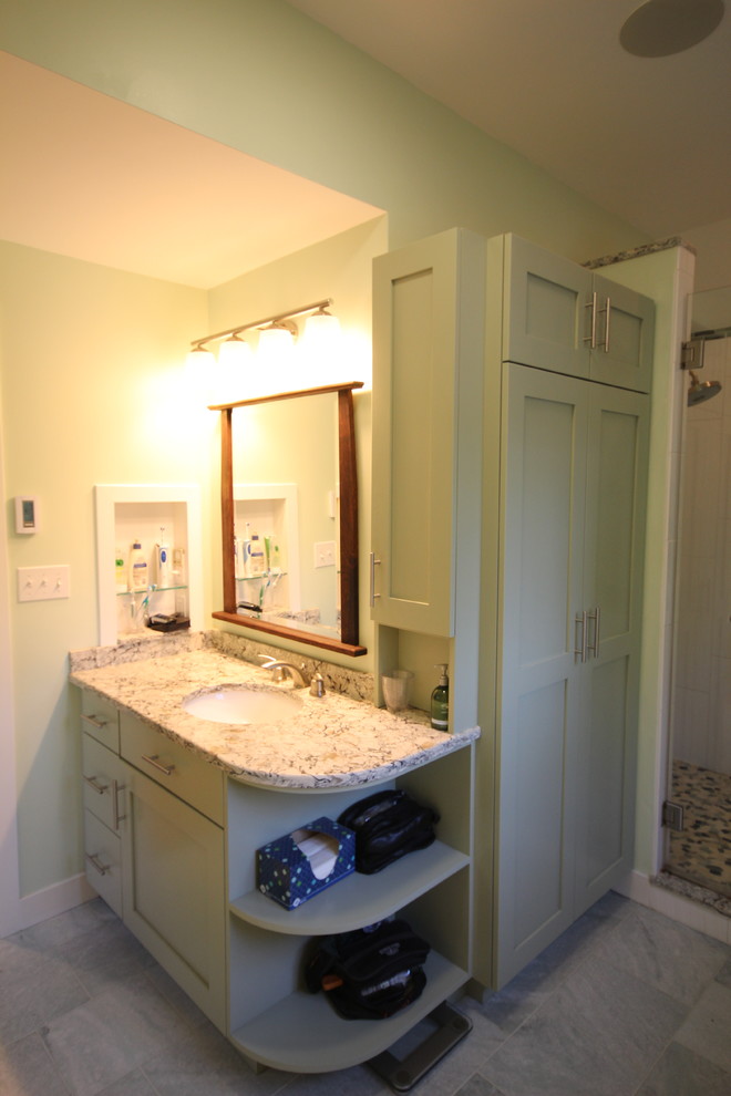 Small beach style master bathroom in Boston with an undermount sink, shaker cabinets, green cabinets, engineered quartz benchtops, a corner tub, an alcove shower, a one-piece toilet, white tile, ceramic tile, green walls and marble floors.