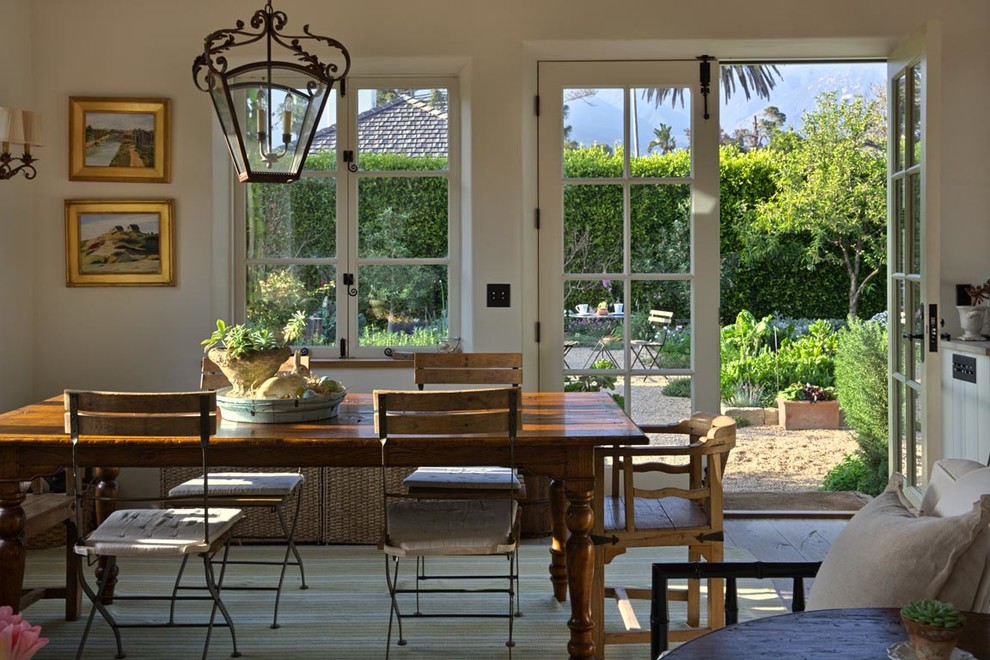 This is an example of a mid-sized mediterranean dining room in Santa Barbara with no fireplace.