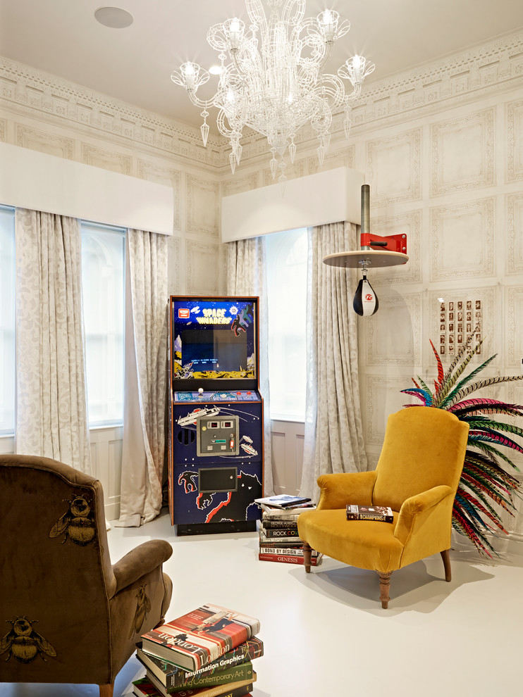 This is an example of an eclectic enclosed family room in London with a game room, white walls and white floor.