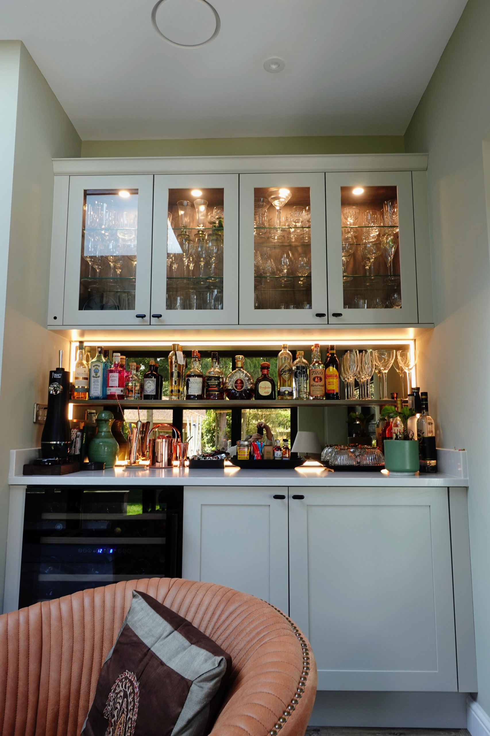Inspiration for a large transitional vinyl floor and brown floor open concept kitchen remodel in West Midlands with a double-bowl sink, shaker cabinets, distressed cabinets, quartzite countertops, whi