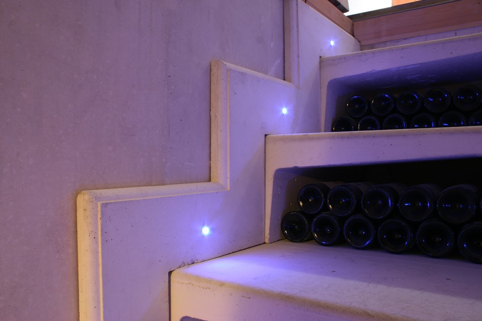 Inspiration for a contemporary wine cellar in Sussex.