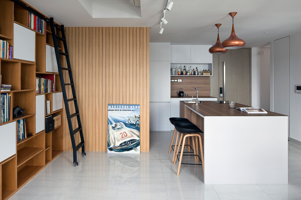 Inspiration for a l-shaped open plan kitchen in Singapore with a drop-in sink, flat-panel cabinets, white cabinets, panelled appliances and with island.