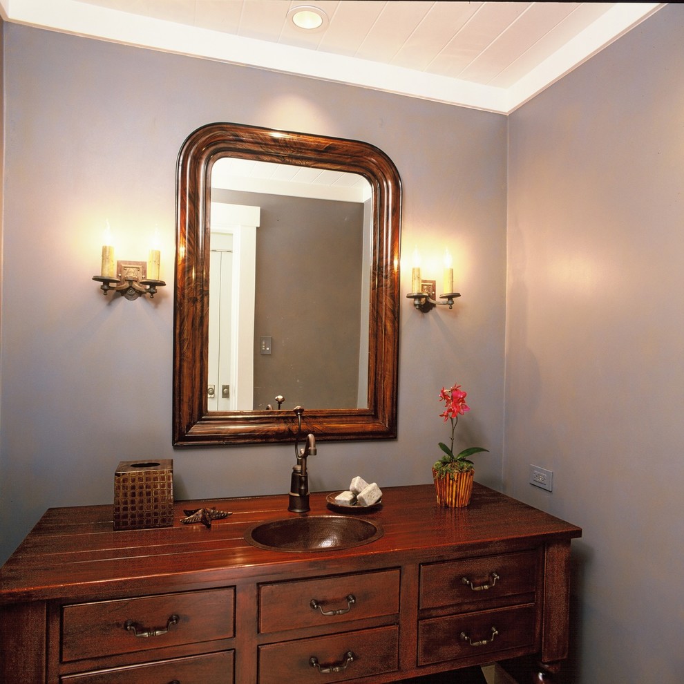 This is an example of a traditional powder room in Santa Barbara.