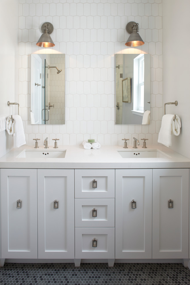Design ideas for a mid-sized transitional master bathroom in San Francisco with shaker cabinets, white cabinets, white tile, ceramic tile, engineered quartz benchtops, white walls, mosaic tile floors and an undermount sink.