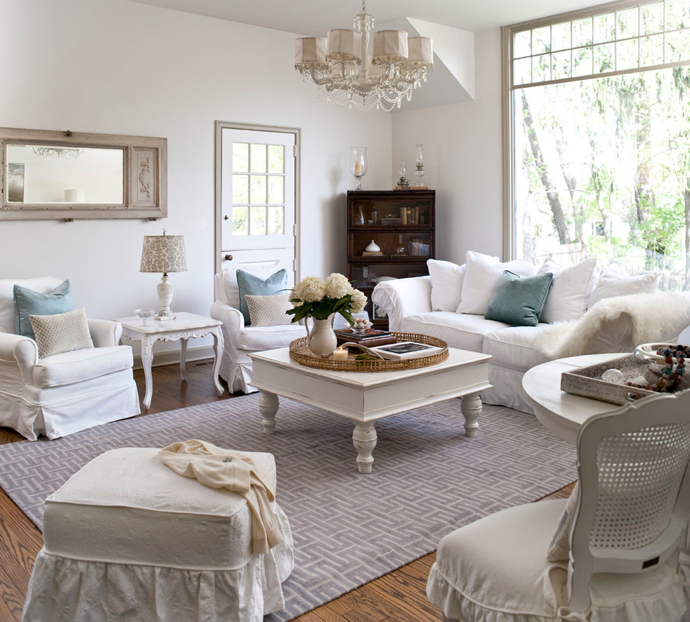 Inspiration for a traditional formal living room in Other with white walls.