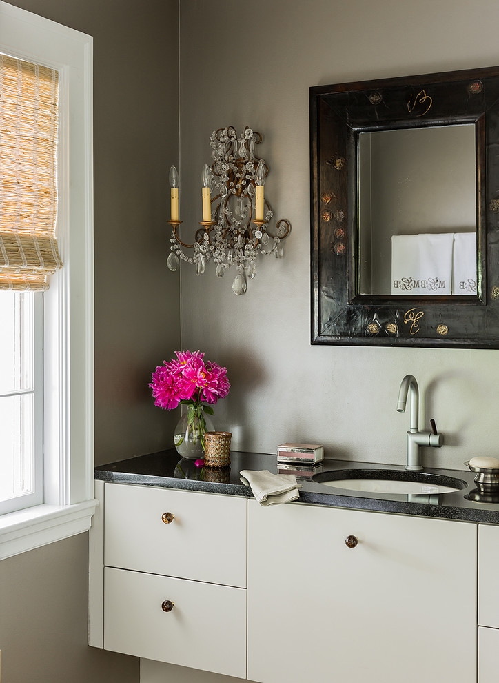 Photo of an eclectic powder room in Boston with an undermount sink.