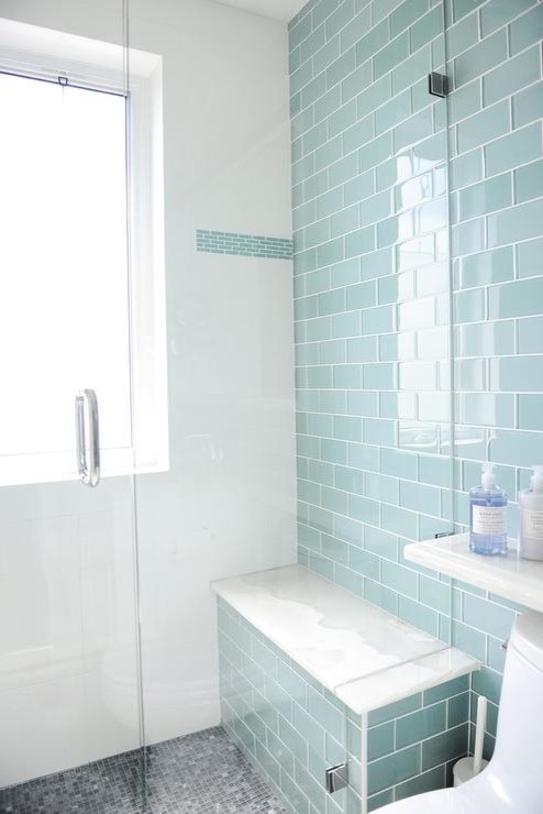 Design ideas for a medium sized beach style shower room bathroom in New York with a walk-in shower, green tiles, metro tiles, green walls and porcelain flooring.