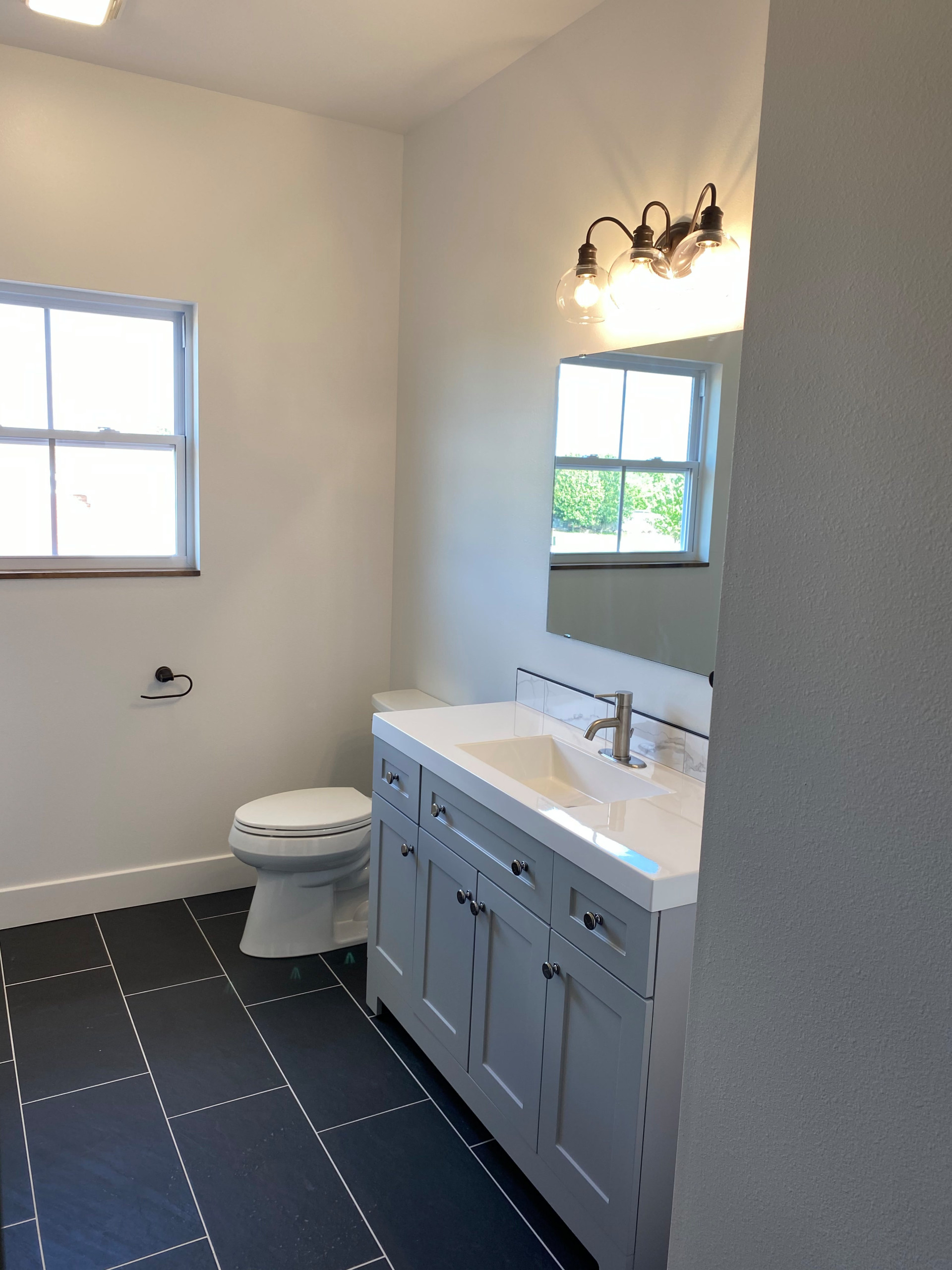 Hall bath with custom painted cabinetry