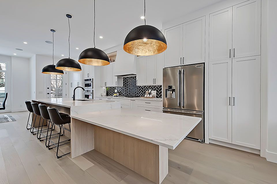 Example of a transitional home design design in Calgary