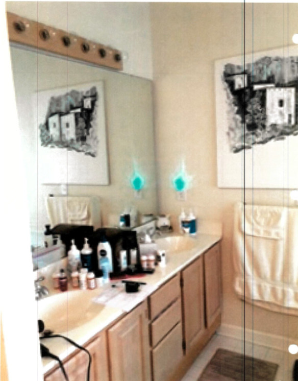 Example of a small transitional master gray tile and porcelain tile vinyl floor and brown floor alcove shower design with shaker cabinets, white cabinets, a two-piece toilet, blue walls, a vessel sink and quartz countertops