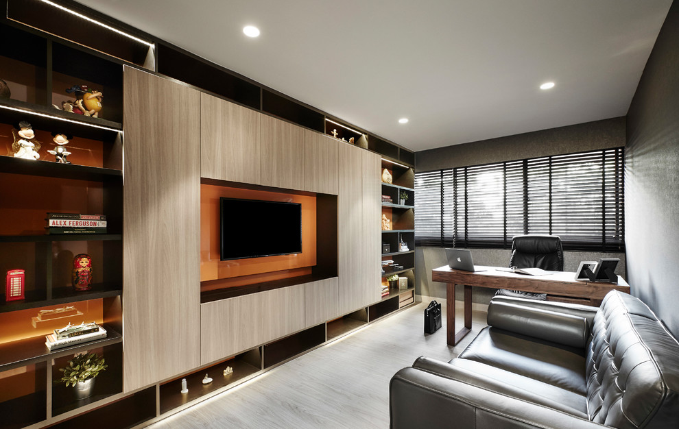 This is an example of a contemporary home office in Singapore.