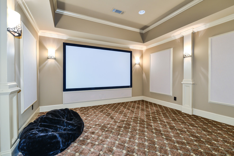 Design ideas for a large transitional open concept home theatre in Atlanta with beige walls, carpet and a projector screen.