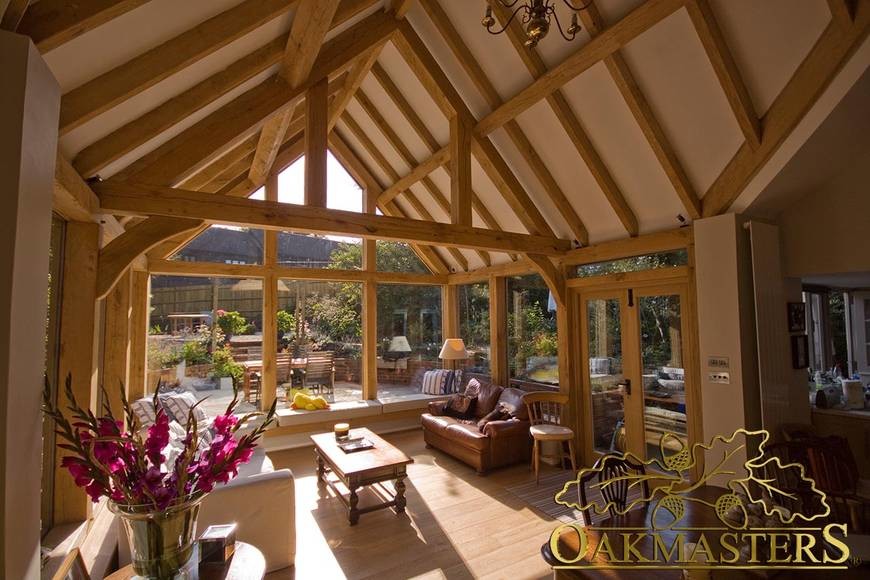 Design ideas for a traditional sunroom in Sussex.