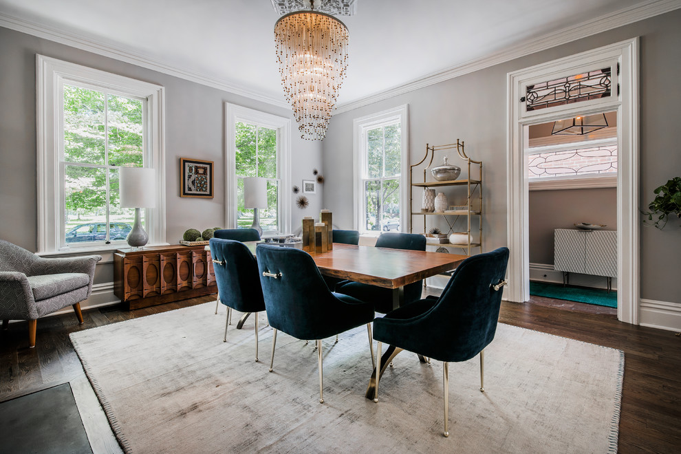 Inspiration for a transitional separate dining room in Columbus with grey walls, dark hardwood floors and brown floor.