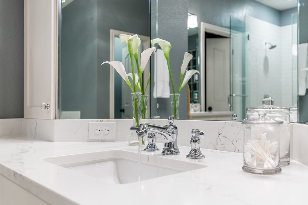 Mid-sized transitional master white tile and ceramic tile porcelain tile corner shower photo in Austin with shaker cabinets, white cabinets, an undermount tub, gray walls, an undermount sink and quartz countertops
